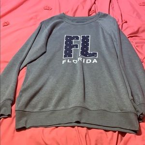 grey pullover/sweatshirt